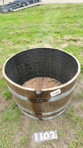 Half old oak barrel planter