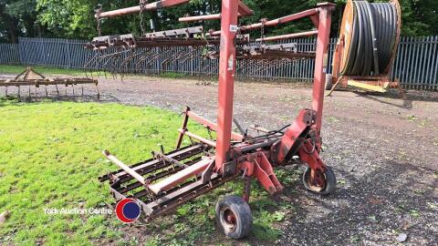 Spring tine folding grass harrows