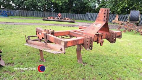 Foster 3 leg mole plough with roller