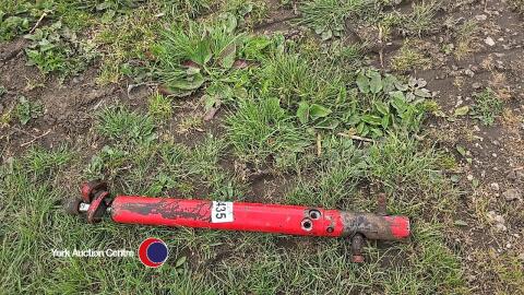 Tractor power steering ram
