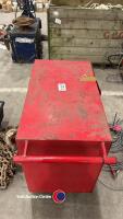 Red tool box on with wheels. Key in office - 2