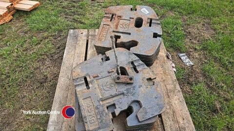 14 New Holland weights, 45kg each