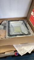 3x 100W PIR floodlights in box