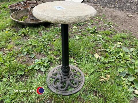 Cast iron garden table with stone top