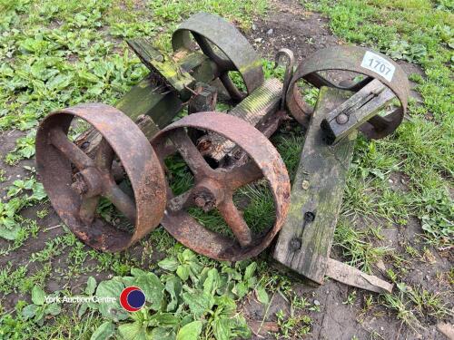 Set of 4 cast iron wheels from a hayrack