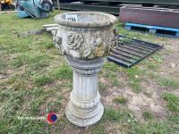 Decorative planter on plinth