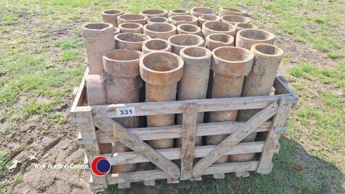Pallet of clay drain pipes