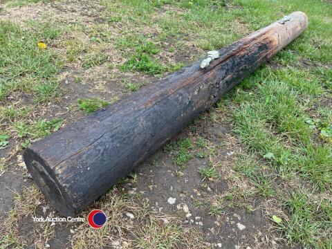 Round wooden gate post with hinges