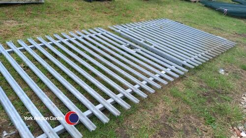 Pair of galvanised metal palisade gates, 2m tall with an opening of roughly 15ft c/w fixings