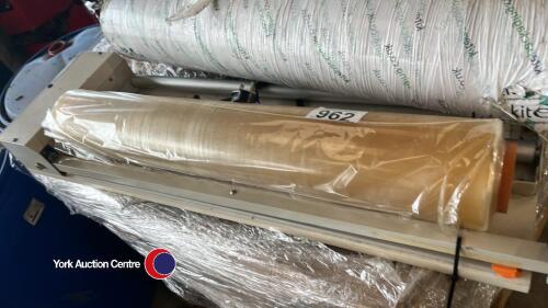 Static wrapper machine and 2 rolls of new wrap