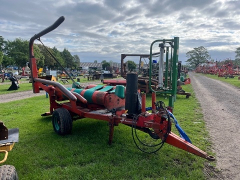 Trailed bale wrapper
