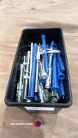 Tub of assorted rawlplugs and ground/wall anchors