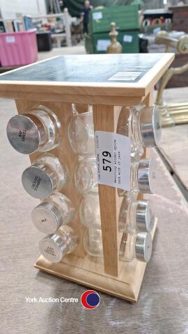 Revolving wooden spice rack with 16 jars