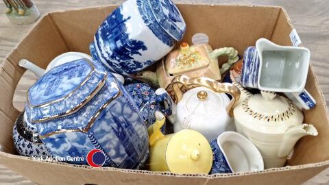 Quantity of Wade teapots, plates and Ringtons tea caddies