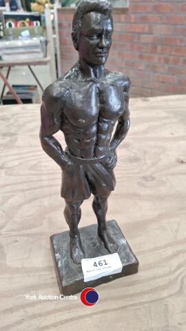 Muscle man statue