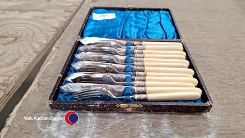 Vintage boxed set of fish knives and forks