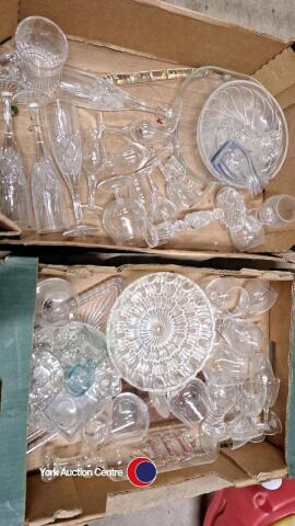 Mixed lot of glassware including cut glass bowls, glasses, ship in a bottle with its stand and candlesticks