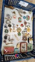 Tray of brooches