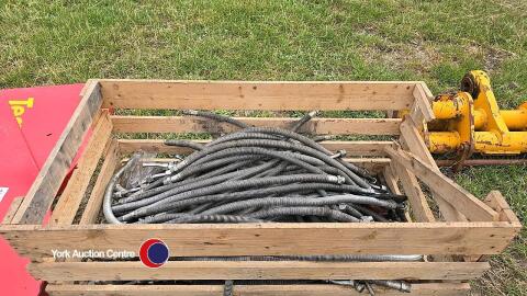 Stillages of hydraulic hoses off diggers