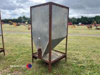 Metal feed bin on frame