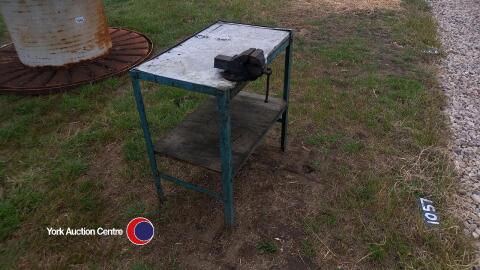 Small metal bench with vice