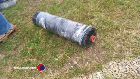 Roll of heavy duty asphalt geogrid reinforcing mat
