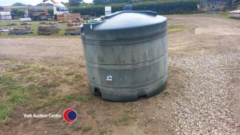Green plastic oil tank, round single skin approx D 1.6m x H 1.4m