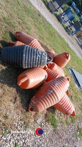 Quantity of large plastic buoys