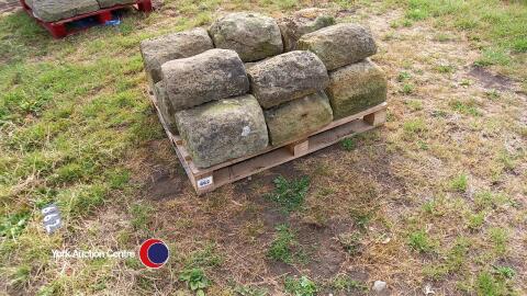 Pallet of sandstone wall toppers