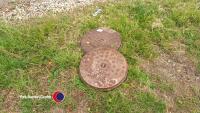 2 round cast iron manholes approx 500mm diameter - 2