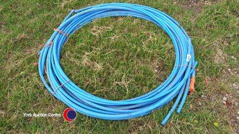 Coil of blue water pipe