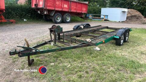Twin axle transport trailer with winch