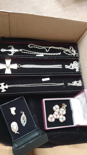 3 x hallmarked silver cross pendants and 4 x hallmarked silver pendants