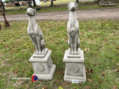 Pair of stone whippets on plinths