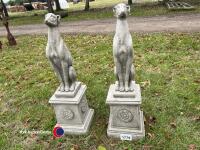 Pair of stone whippets on plinths