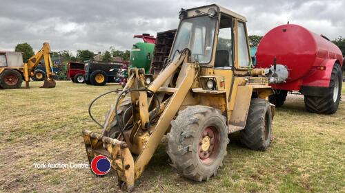 Kramer 412E loader, key in office