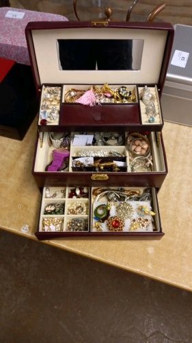 Brown leather box of jewellery