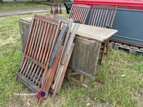 Teak table and 6 chairs, collapsible