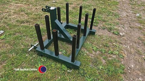 Front linkage bale wrap carrier