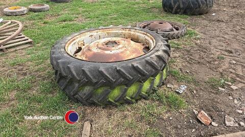 Pair of row crop wheels, 8 stud, 9.5 x 44, inflated.