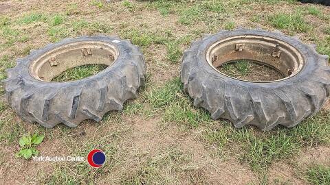Pair of Firestone 12.4 R28 on rims without centre dish