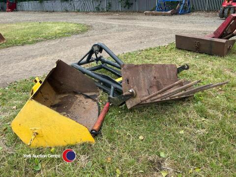 Back end loader with bucket and muck forks, wo