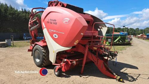 Lely Welger RPC 445 Tornado round baler and wrapper, control box in office