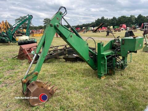 Lewis compact back hoe
