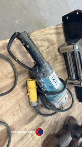 Makita 9 inch grinder 110v. GWO