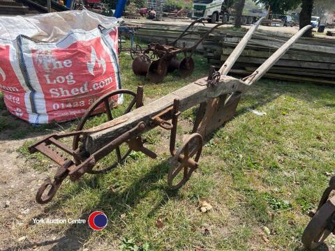 Wooden horse drawn single furrow plough