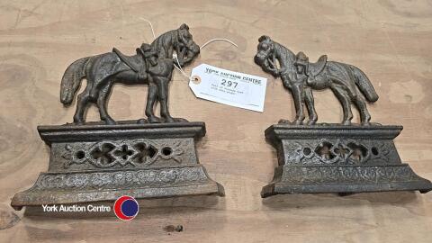 Pair of vintage cast iron door stops