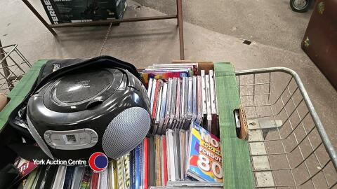 Box of CD’s and CD player