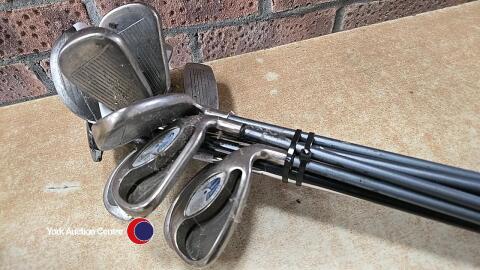 Golf Clubs and bag of golfing paraphenalia