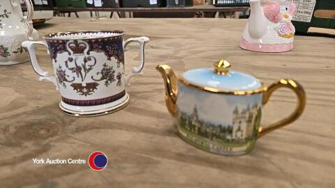 Balmoral Castle, miniature teapot H 6cm W 5 and The Royal Collection, Queen Victoria two handled commemorative mug H 7.5cm W8